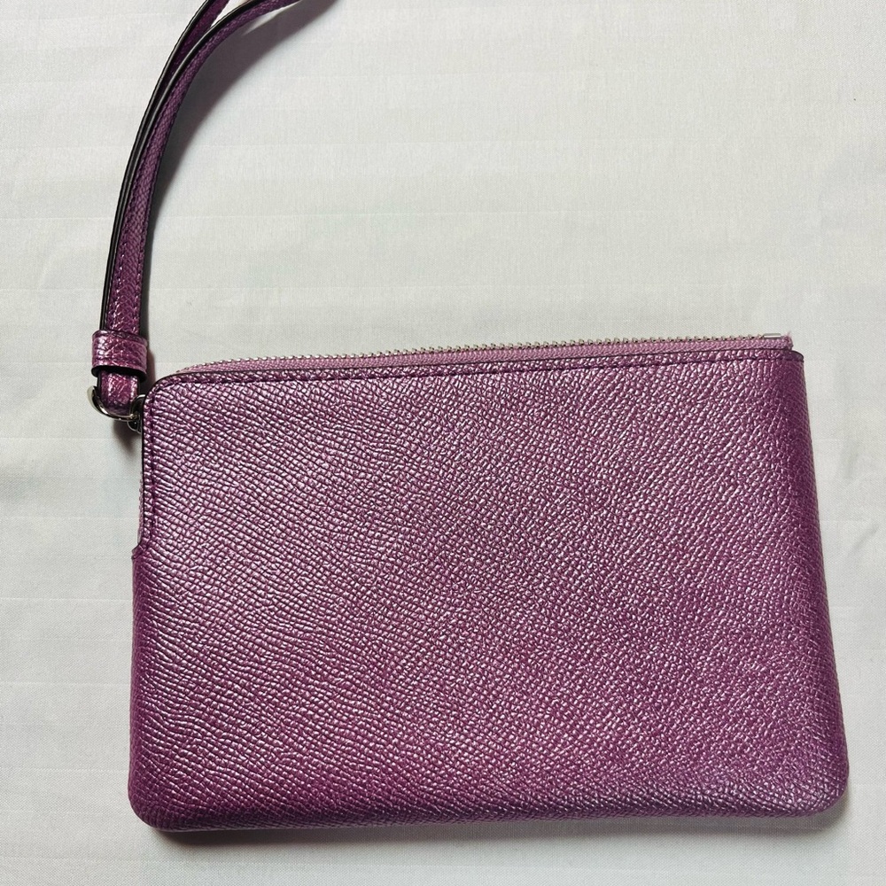 Coach wristlet, metallic pink, like-new condition